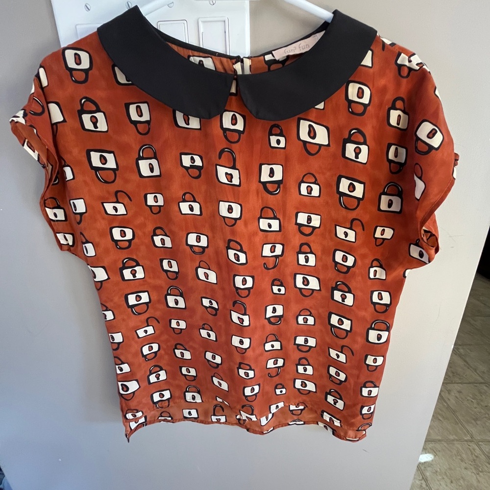Peter Pan collar Fun 2 Fun Orange and Black locks print